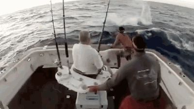 Fish in the boat and man overboard