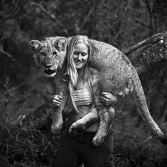 A-girl-with-a-young-lion.jpg