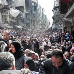 The Queue for Food at a Syrian Refugee Camp