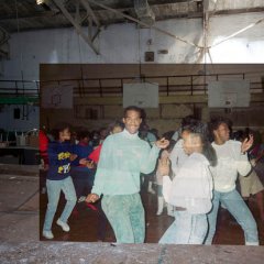 An abandoned school is filled with life using images from the past