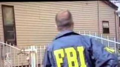 FBI agent jumps open fence