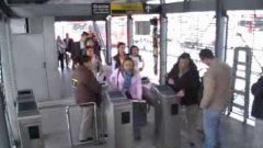 Man Trips Woman At Travel Gate