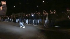 Crazy man jumps over Lamborghini
