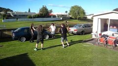 Four Men Jump Through Hula Hoop