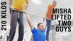 Russian Overhead Squats Two Men
