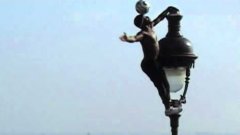 Amazing Soccer Tricks Hanging On Street Light