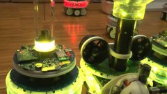 Robot Swarm Work Together To Retrieve Book
